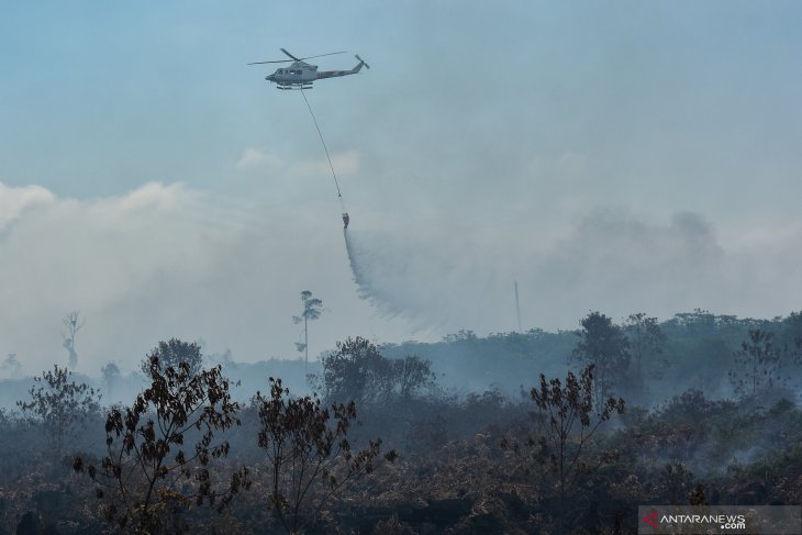 Indonesian govt deploys 10 helicopters, one Cassa to put out forest fires in Sumatra