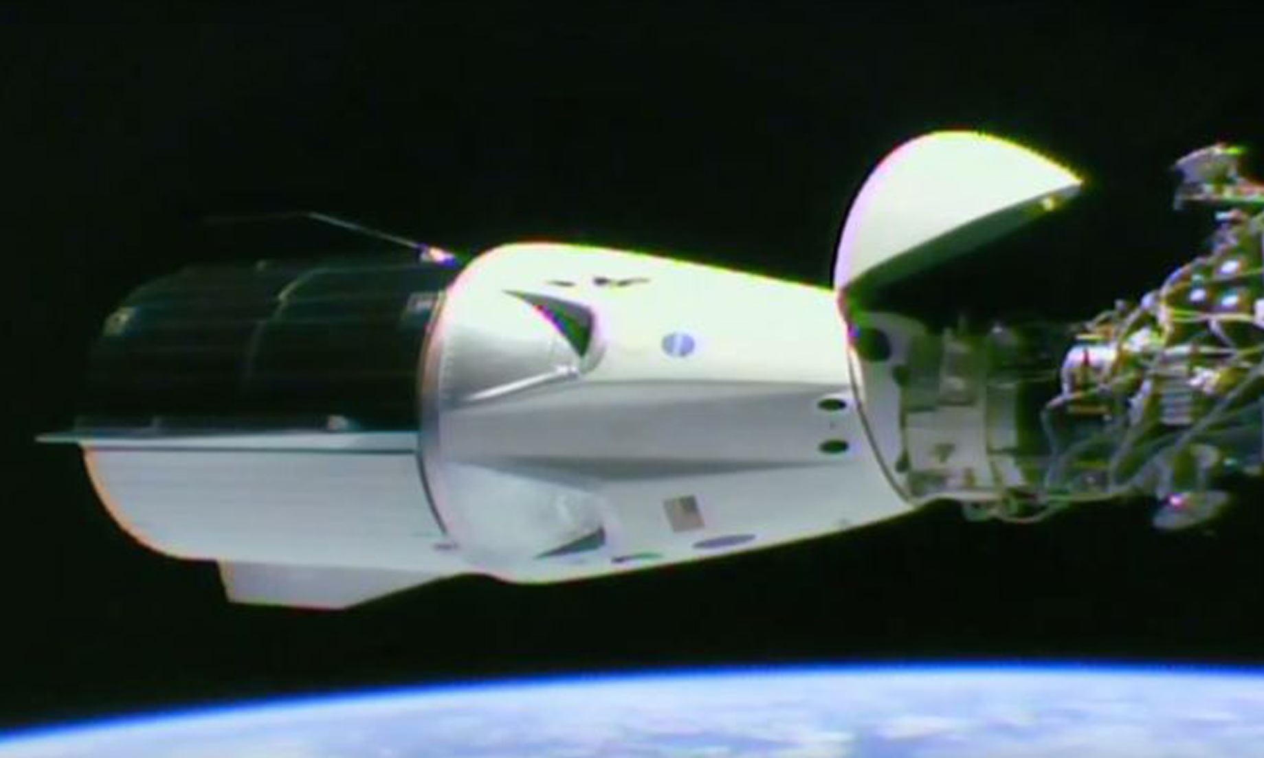 SpaceX capsule successfully docks with International Space Station