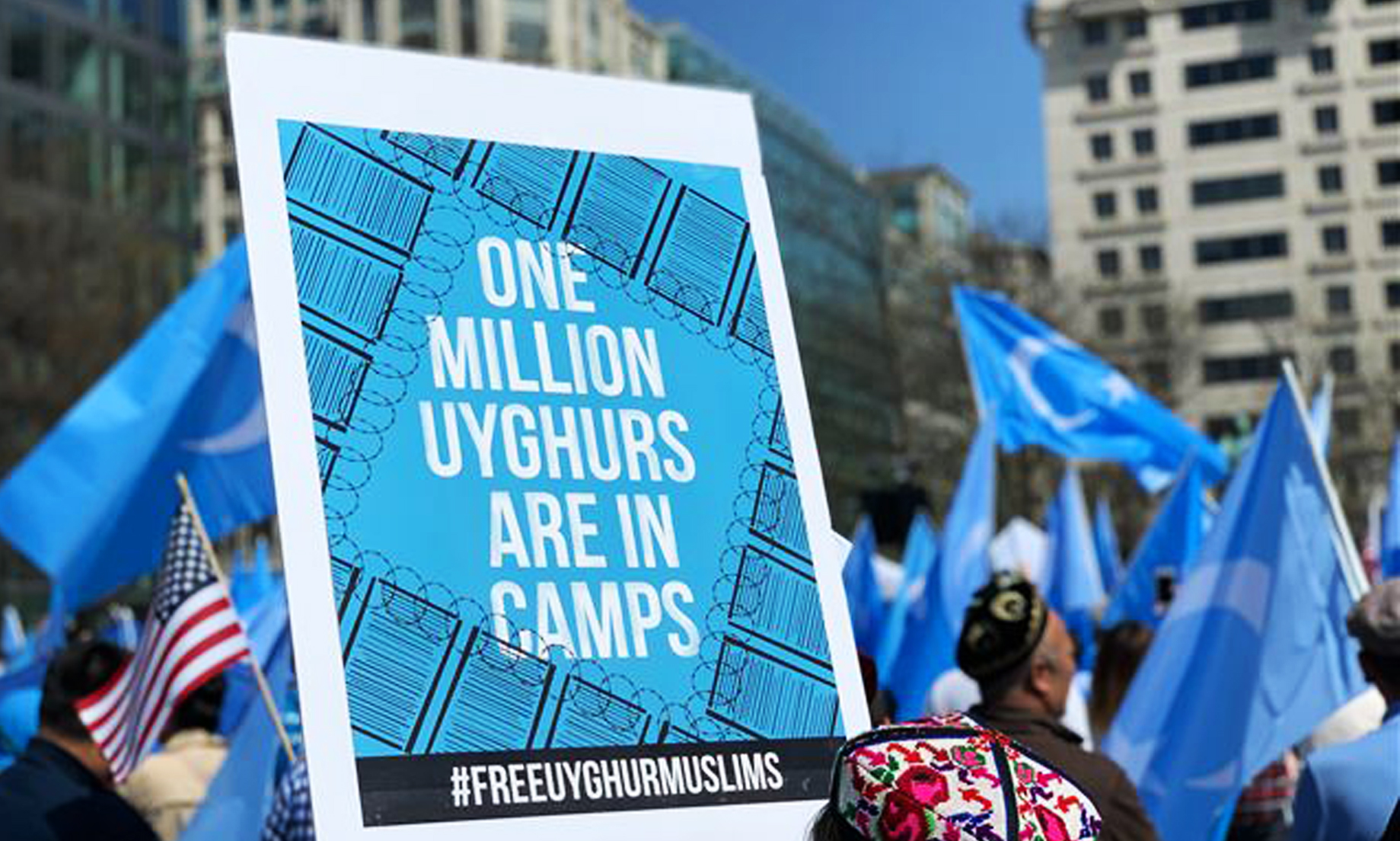 Hundreds protest China, urge US action for Uighurs