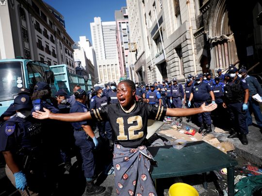 South African police evict migrant squatters from Cape Town’s busy square