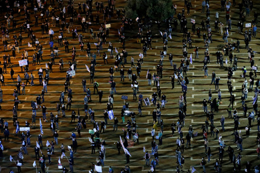 Thousands of Israelis demonstrate against Netanyahu to ‘let democracy win’