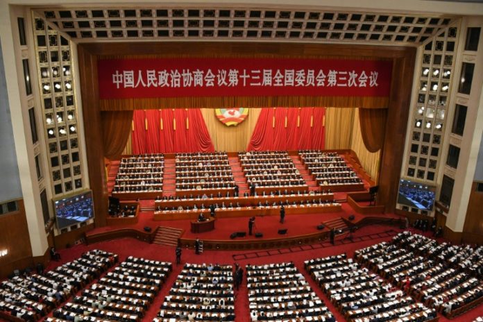 Update: China’s top political meetings open with minute’s silence for virus victims
