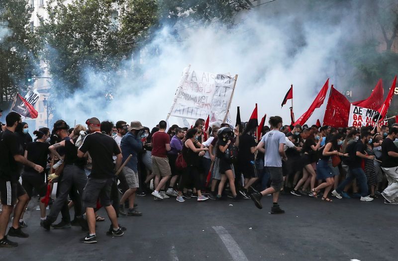 Greek police use teargas on crowds protesting against demonstration law