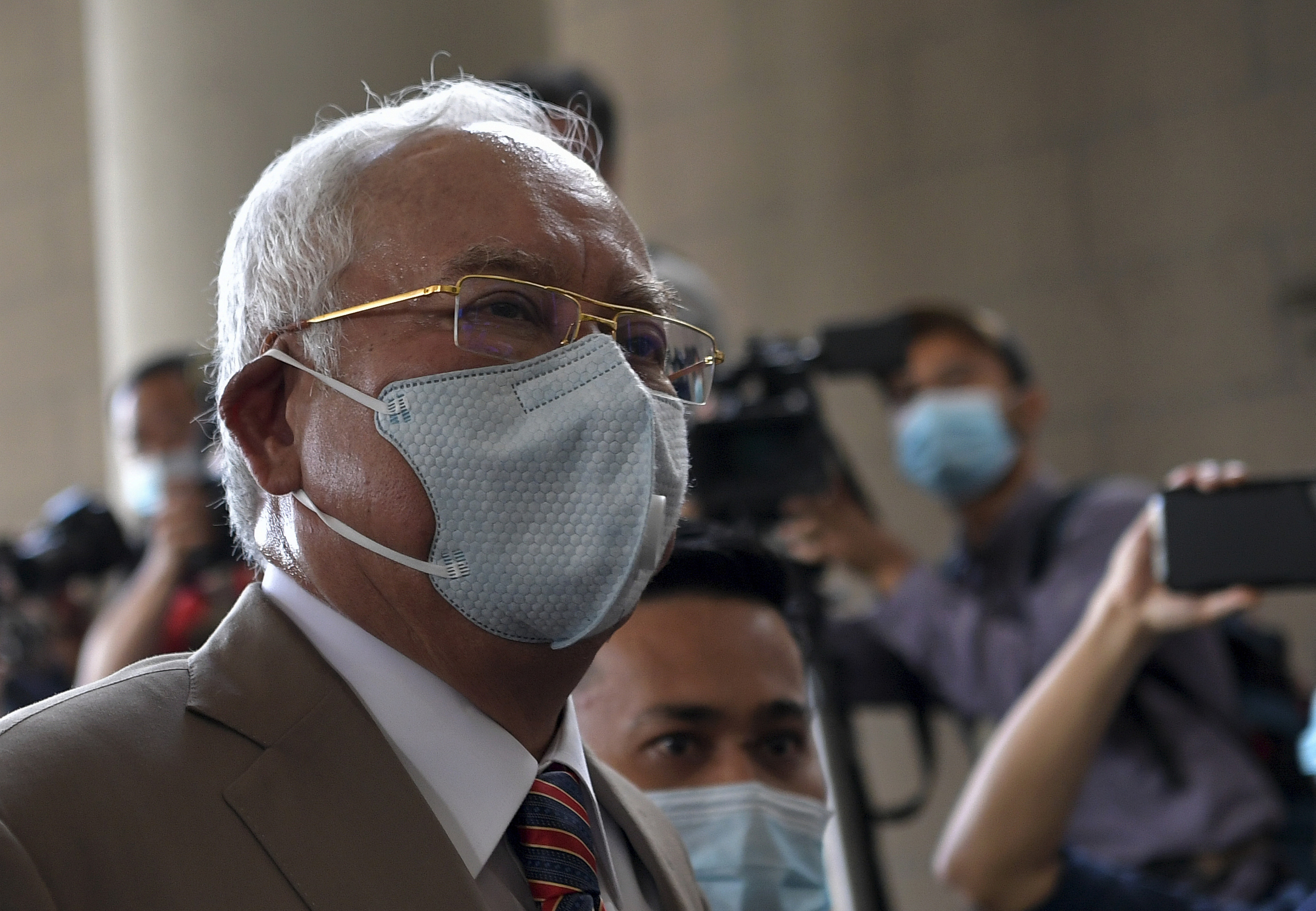 Update 2: Former Malaysian PM found guilty in SRC case, sentenced to 12 years jail, fined RM210 mln