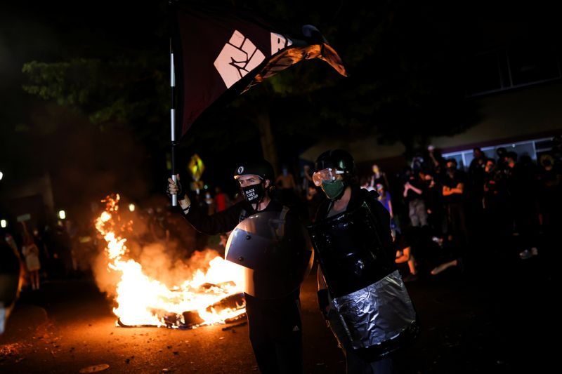 US unrest: Police arrest 15 more after overnight protests in Portland