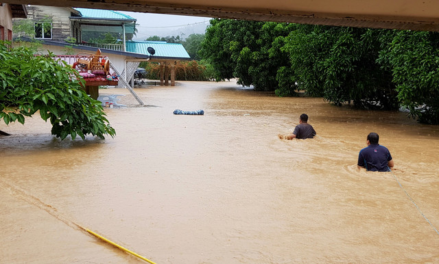 Sabah floods have made some roads inaccessible while residents worry