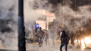 Violent clashes continue in Tunisia; dozens arrested