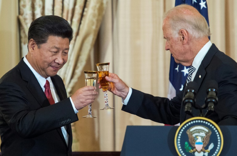 US Pres Biden presses Chinese counterpart Xi on HK, Xinjiang in first phone call