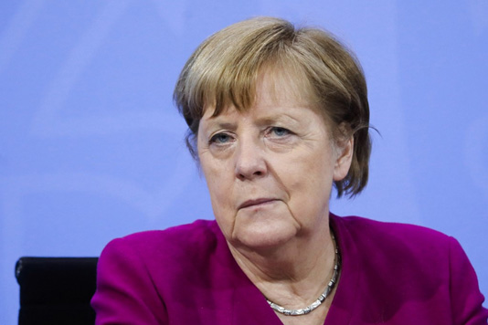 Covid-19: Bowing to pressure, German Chancellor Merkel eases virus curbs