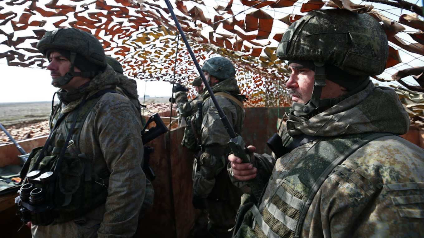 Ukraine says Russia massing troops on border, US warns Moscow