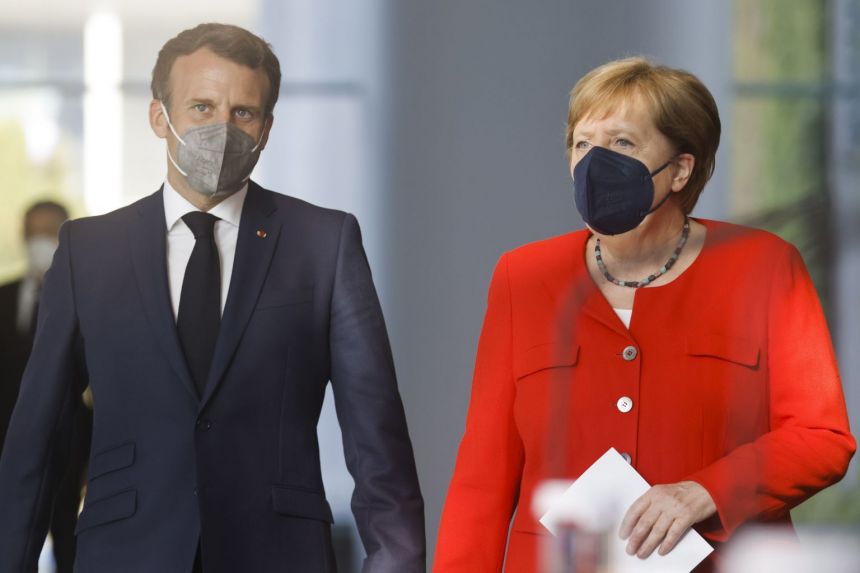 Merkel and Macron urge EU coordination on reopening borders