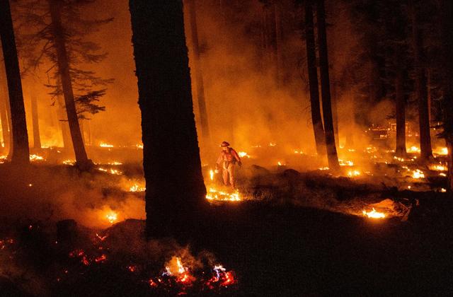 US wildfires: California wildfire flares but within line crews have built