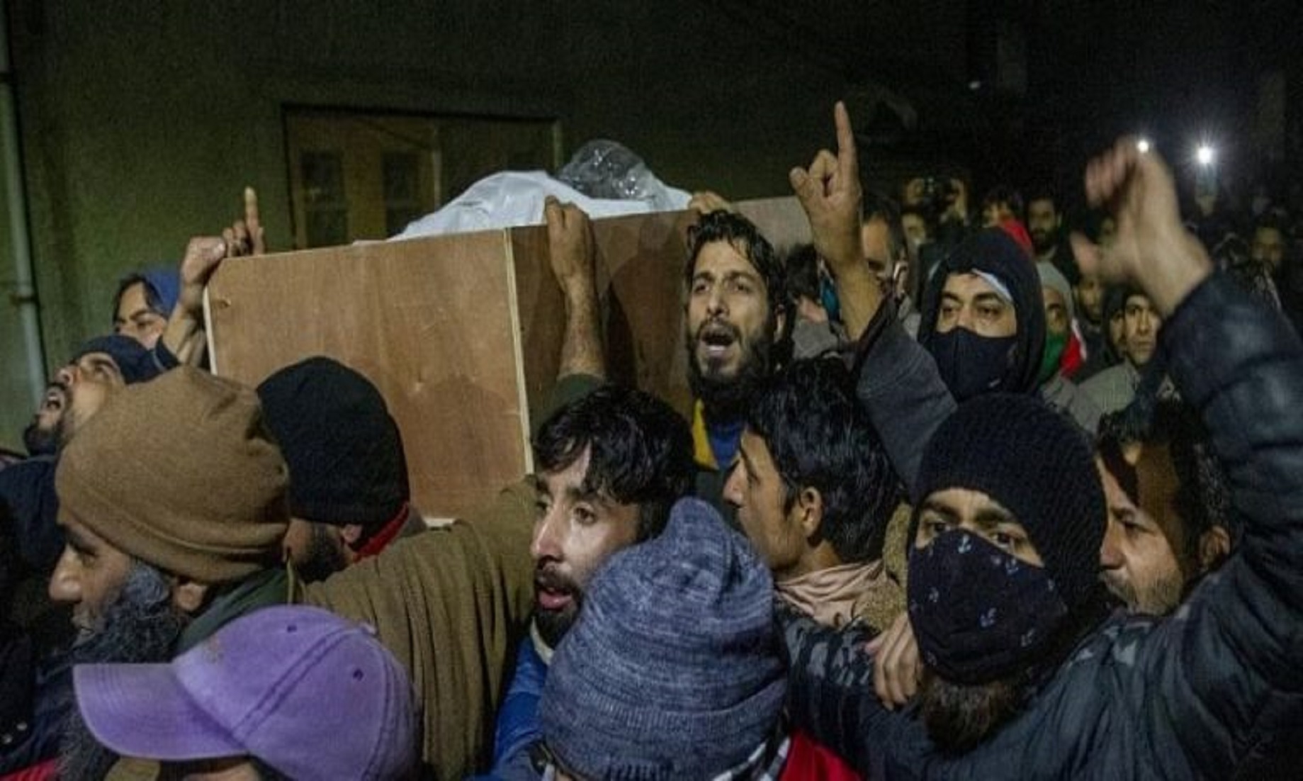 Authorities In Indian-Controlled Kashmir Exhume Two Bodies Killed In Gunfight