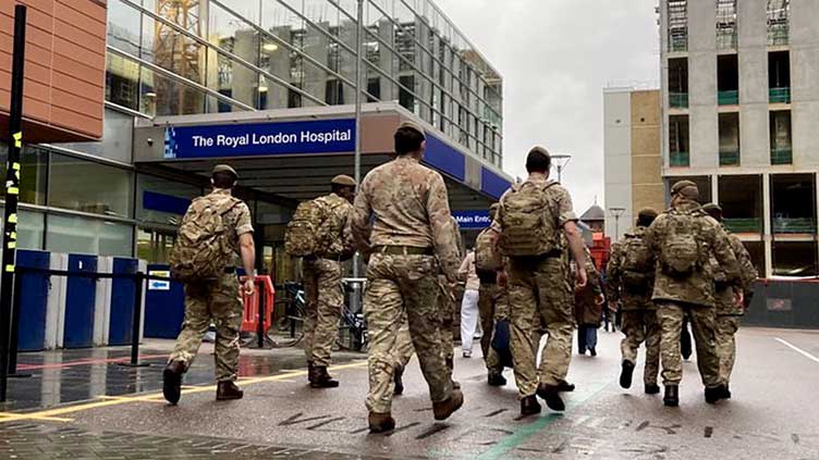 Covid-19: UK to deploy troops to virus-hit London hospitals as PM Johnson declares hospitals on “war footing”