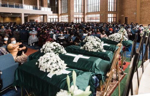 South Africa flood survivors bury loved ones