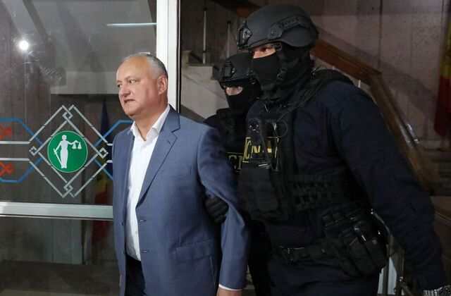 Moldova places former President Dodon under house arrest