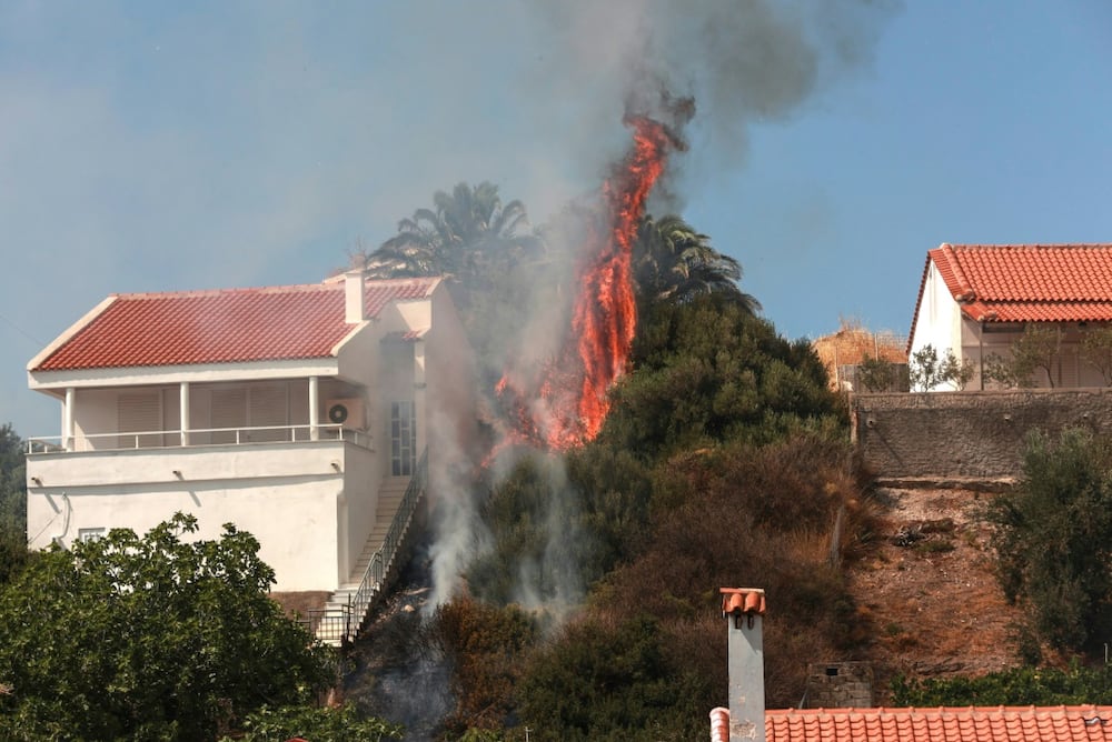 Greece battles fierce wildfires amid heatwave