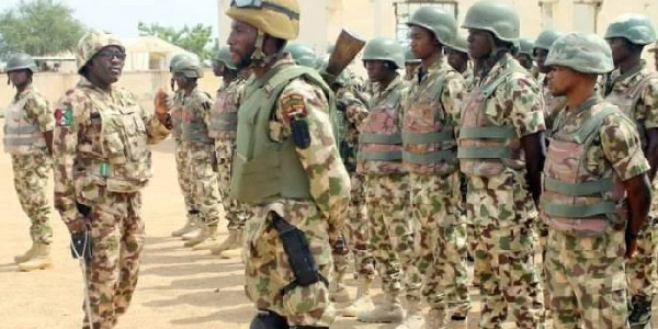 Nigerian Army arrests two suspected terrorists while withdrawing N14million inside a bank