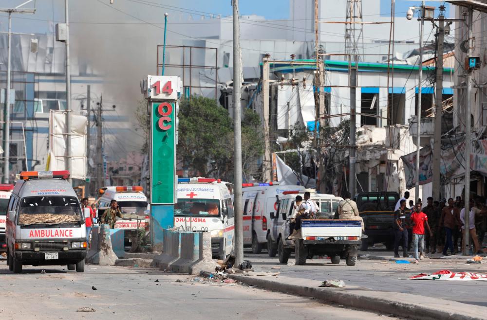 Death toll from Somalia twin bombings climbs to 100