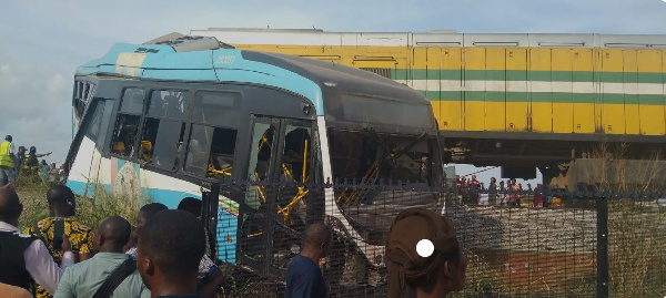Nigeria bus crashes into train; 6 dead and dozens injured