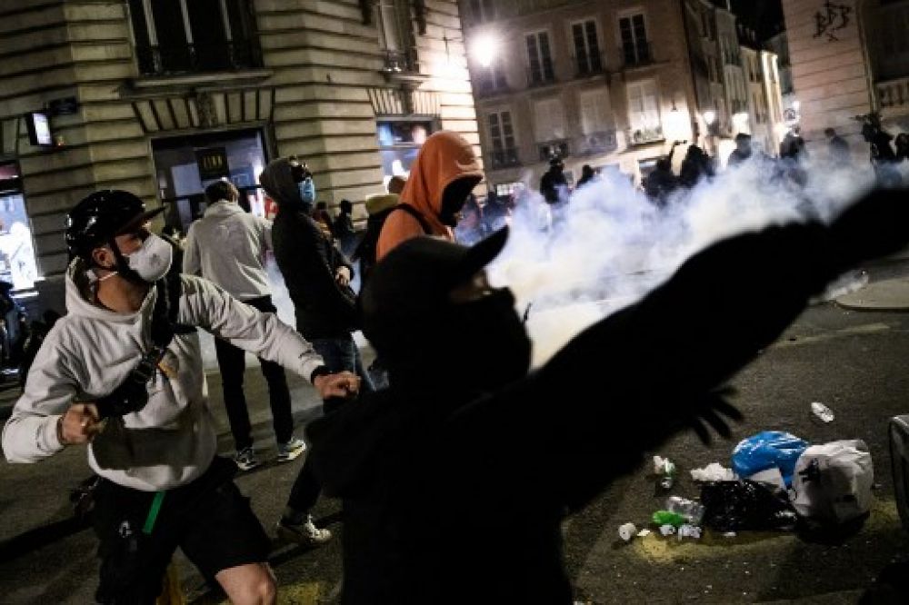 Protests rock France after Macron rams through pension reform