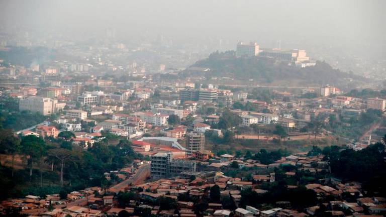 16 die when bus transporting corpse and mourners collided head-on with truck in Cameroon