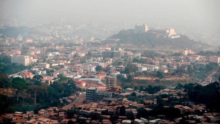 16 die when bus transporting corpse and mourners collided head-on with truck in Cameroon