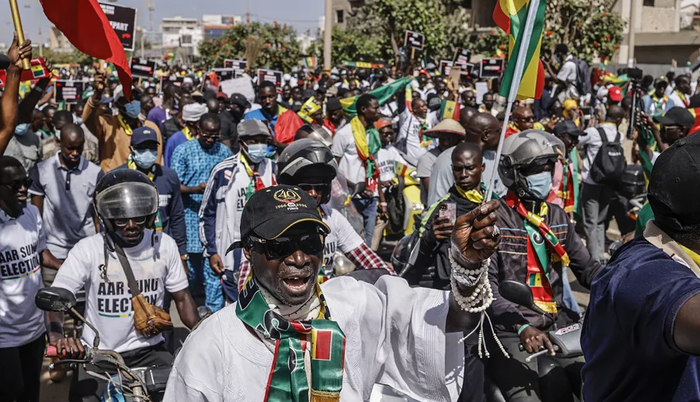 Senegal election: Opposition supporters march in Dakar calling for swift vote