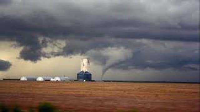 Update: Scores of tornadoes lash central US plains states