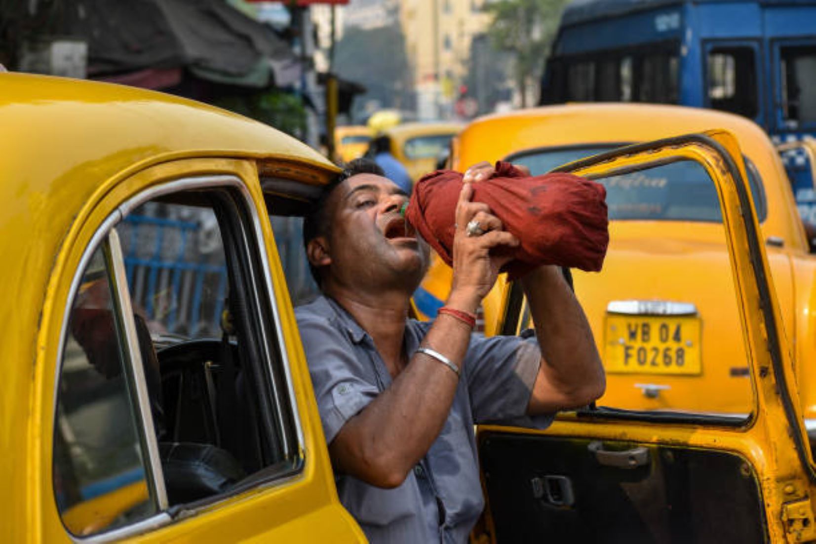 Feature: Heatwave Hits Taxi Drivers’ Wallets In Myanmar