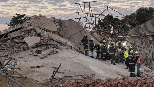 Update: South Africa rescuers say in contact with 11 people in collapsed building