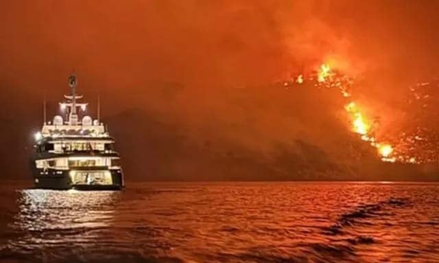 Superyacht crew held over Greek island forest fire