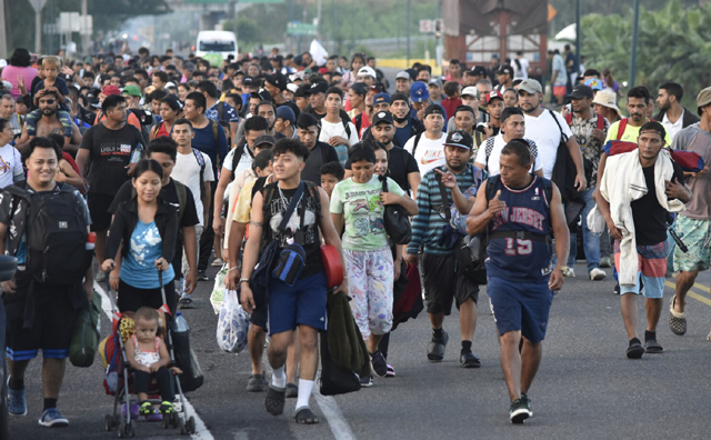 Migrants set out from Mexico hoping to reach pre-Trump US