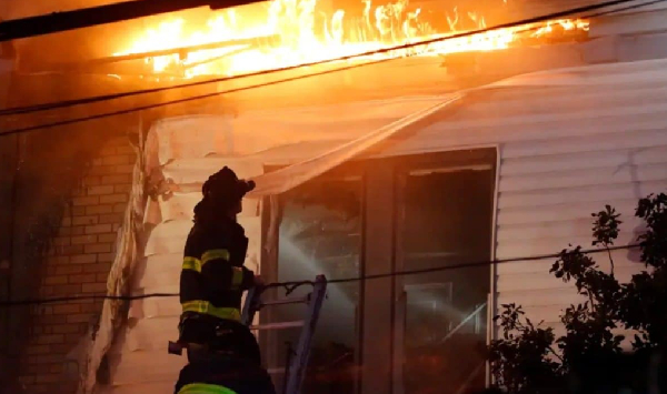 US: Fast-spreading blaze brings down 3 Bronx homes, leaving 13 firefighters injured