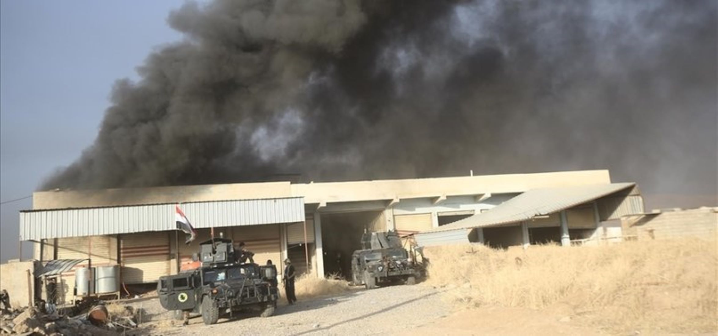 Two Rockets Hit Airbase Area In N. Iraq