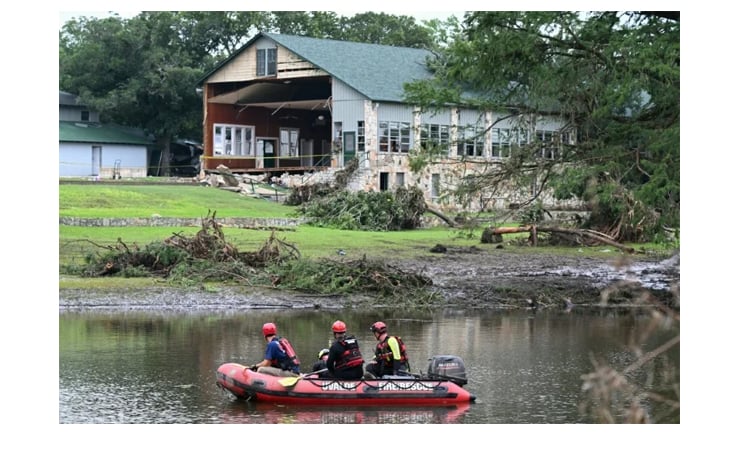 Update Texas floods: Rescuers on horseback, with dogs search for flood victims