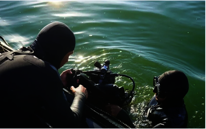Kazakhstan Finds Dead Body, Fragments Of Missing Military Helicopter In Lake