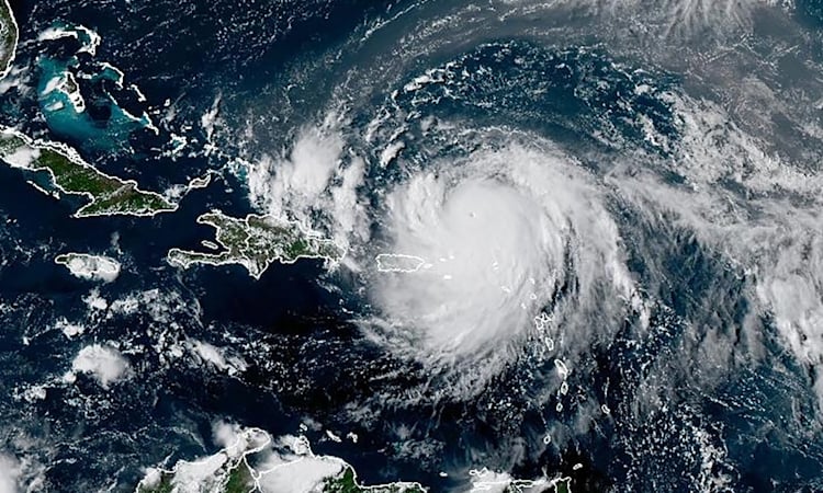 Hurricane Erin douses Caribbean, menaces US coast