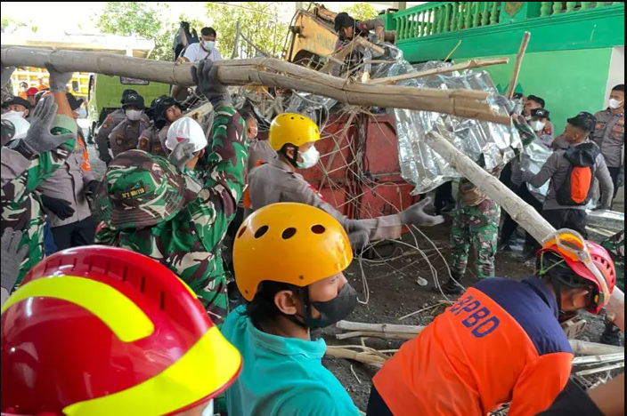 Latest: Death Toll From Indonesia School Building Collapse Rises To 20